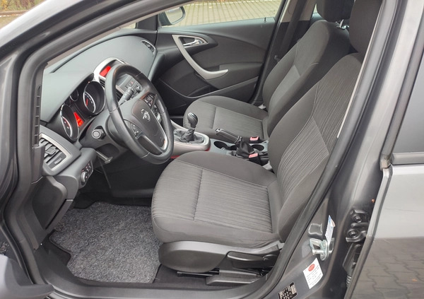 Opel Astra cena 24999 przebieg: 118000, rok produkcji 2011 z Puszczykowo małe 191
